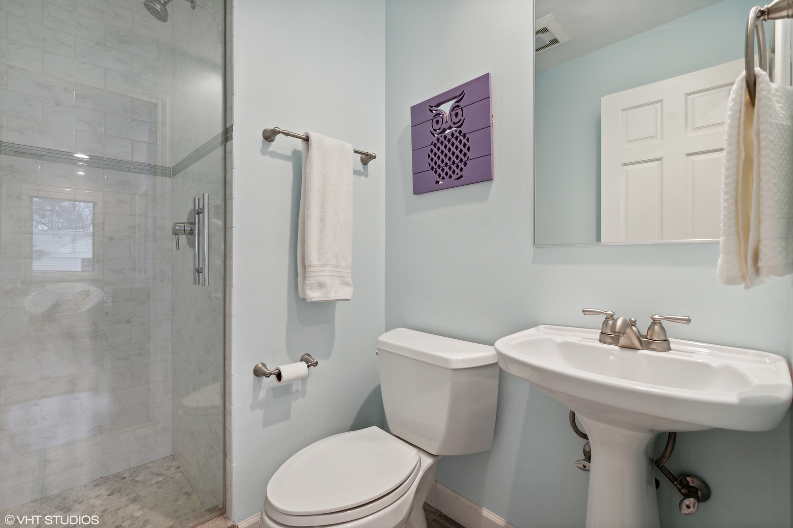 1041 Pontiac Road Wilmette, IL 60091 - Photo 22 of 33 a white toilet sitting next to a bathroom sink