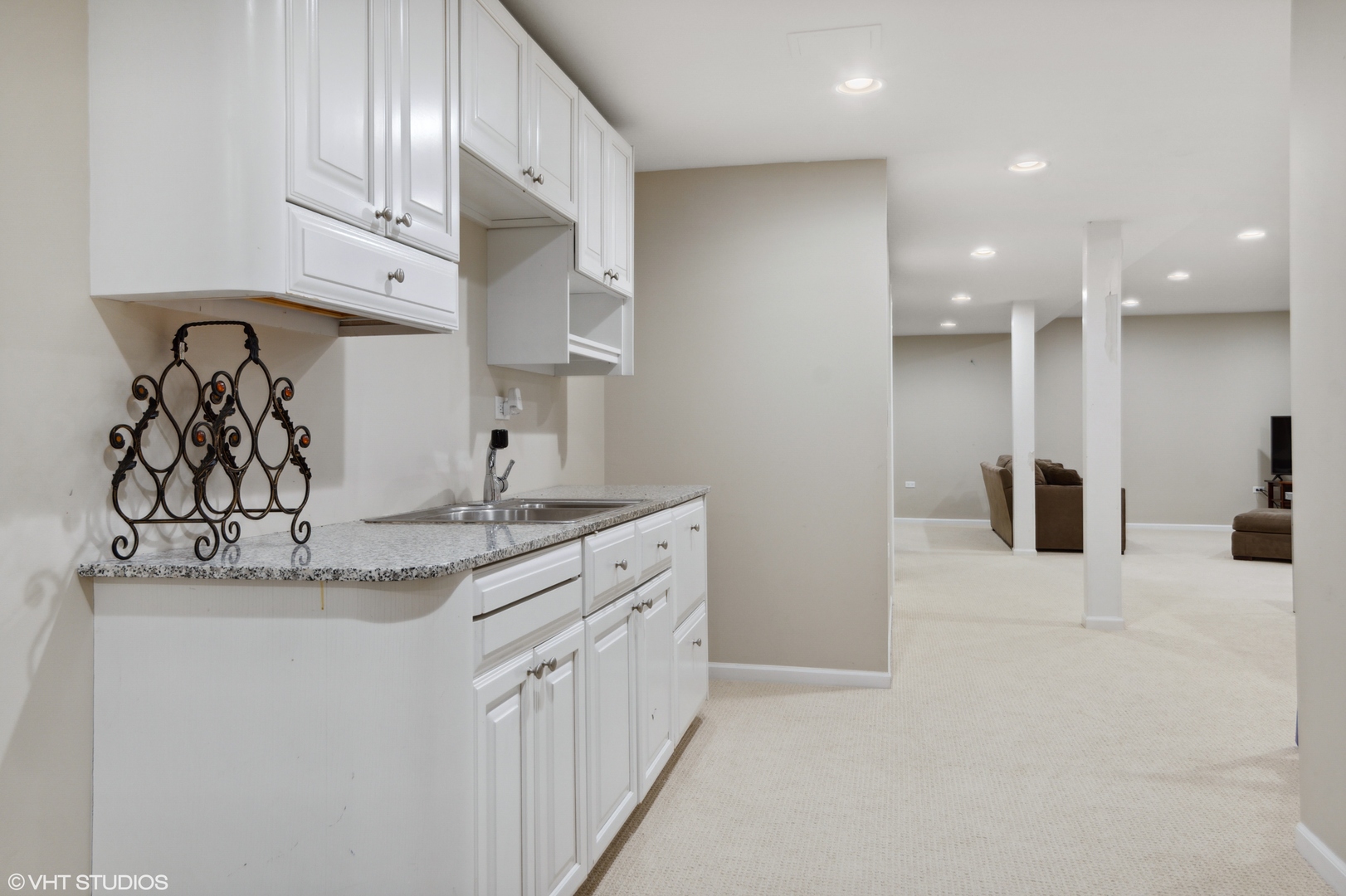 1041 Pontiac Road Wilmette, IL 60091 - Photo 24 of 33 a kitchen with stainless steel appliances granite countertop a sink a stove and a refrigerator