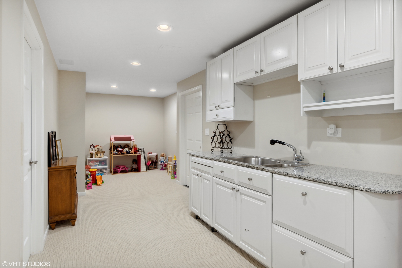 1041 Pontiac Road Wilmette, IL 60091 - Photo 25 of 33 a kitchen with granite countertop a sink and cabinets