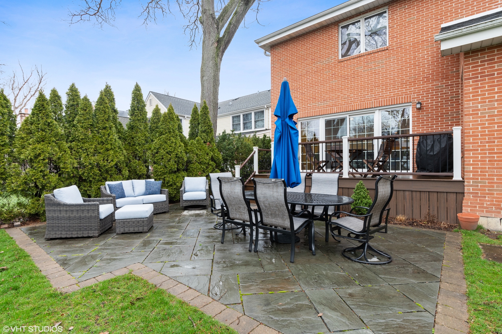 1041 Pontiac Road Wilmette, IL 60091 - Photo 28 of 33 a view of a patio with couches table and chairs and potted plants