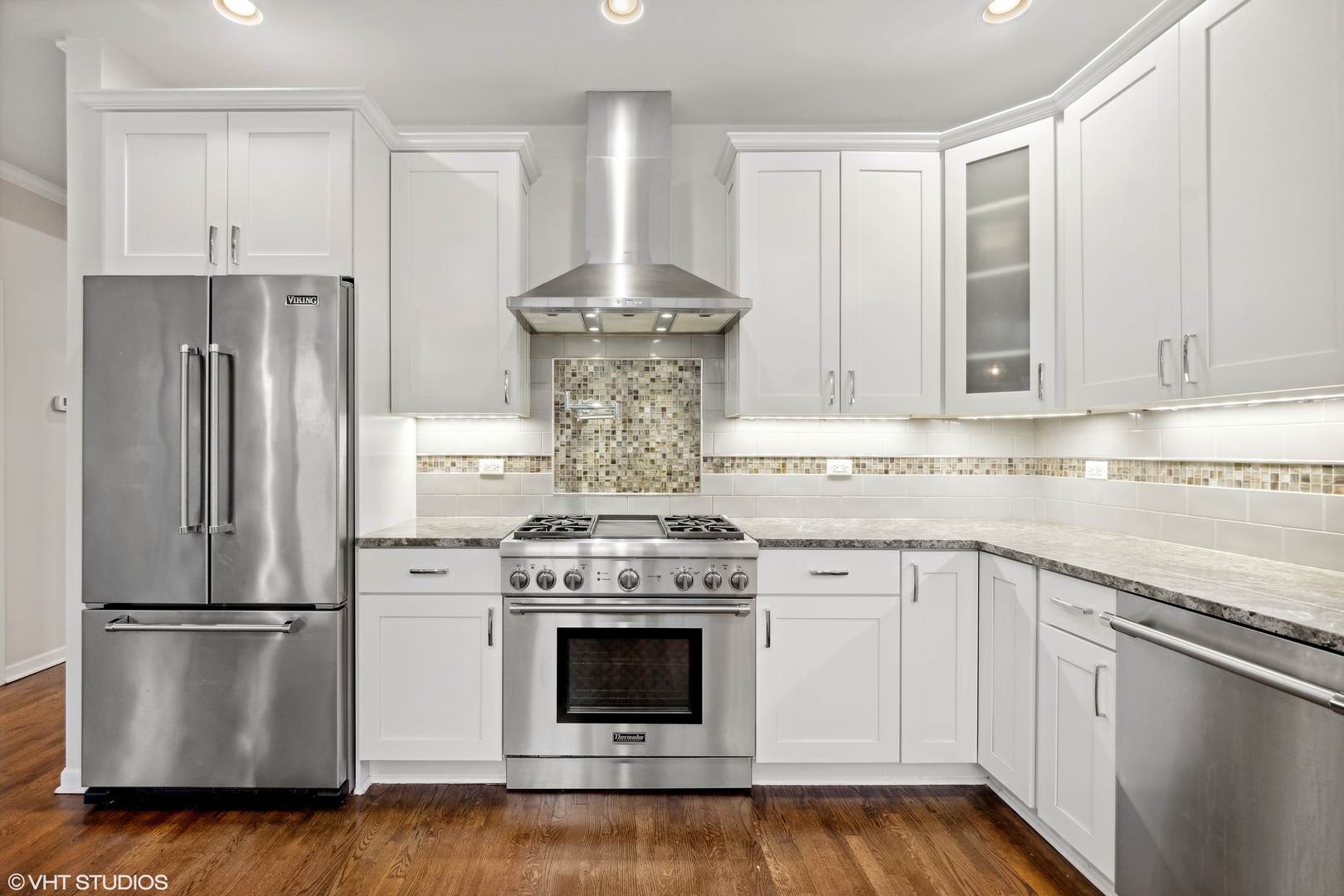 1041 Pontiac Road Wilmette, IL 60091 - Photo 7 of 33 a kitchen with a stove top oven and refrigerator