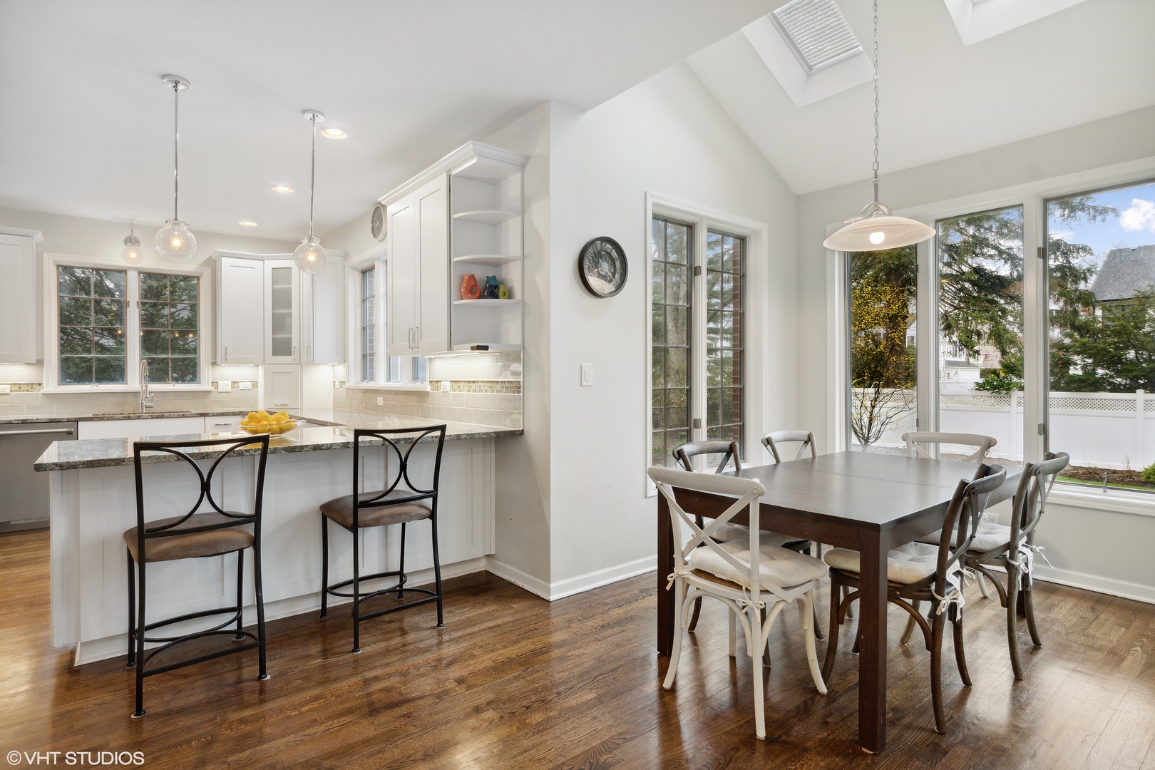 1041 Pontiac Road Wilmette, IL 60091 - Photo 9 of 33 a view of a dining room with furniture window and wooden floor