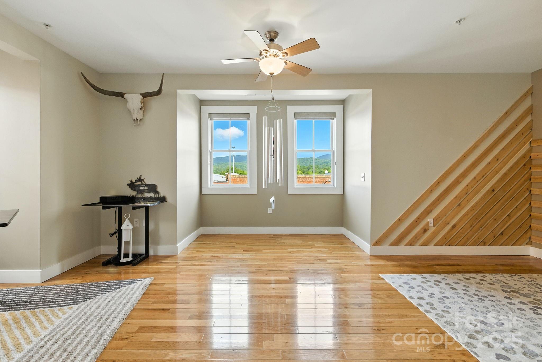 23 South Broad Street Brevard, NC 28712 - Photo 19 of 30 a view of an empty room and window