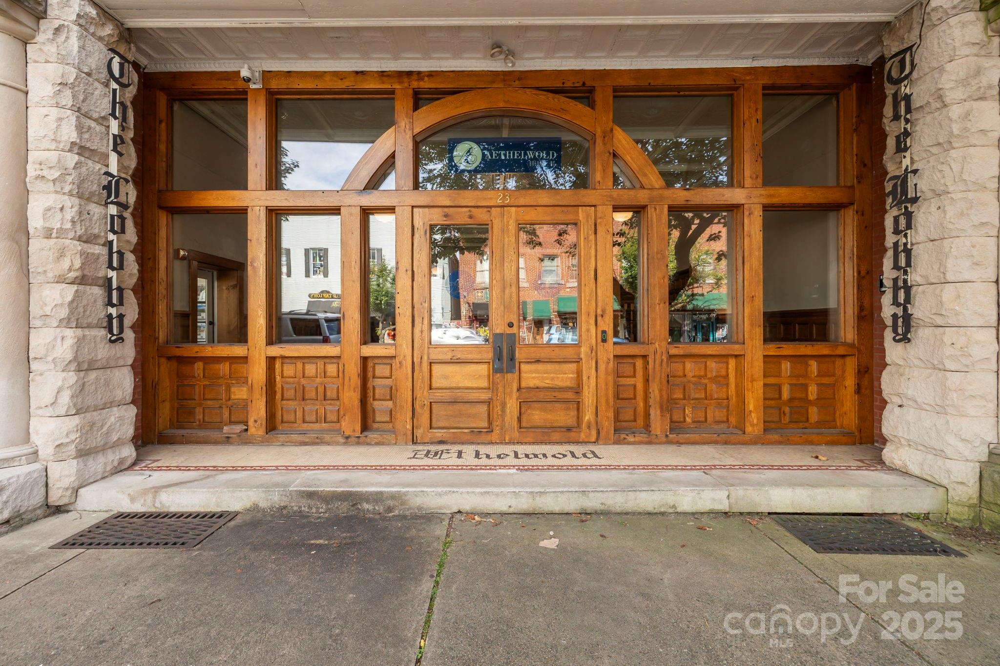 23 South Broad Street Brevard, NC 28712 - Photo 2 of 30 front view of a brick house