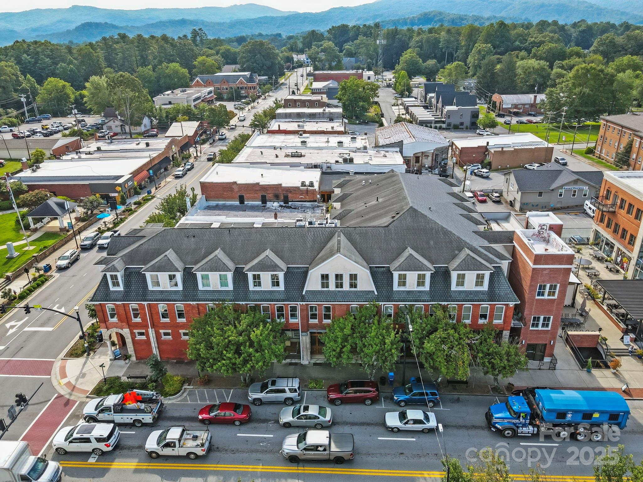 23 South Broad Street Brevard, NC 28712 - Photo 30 of 30 a picture of city view with cars parked