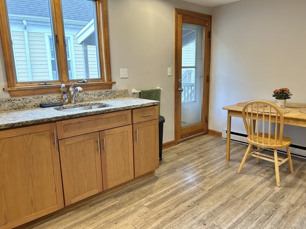 13 Princeton Street, Unit 2 Somerville, MA 02144 - Photo 2 of 9 a bathroom with a sink and a window
