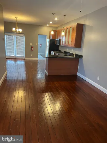 a kitchen with counter top space and a sink