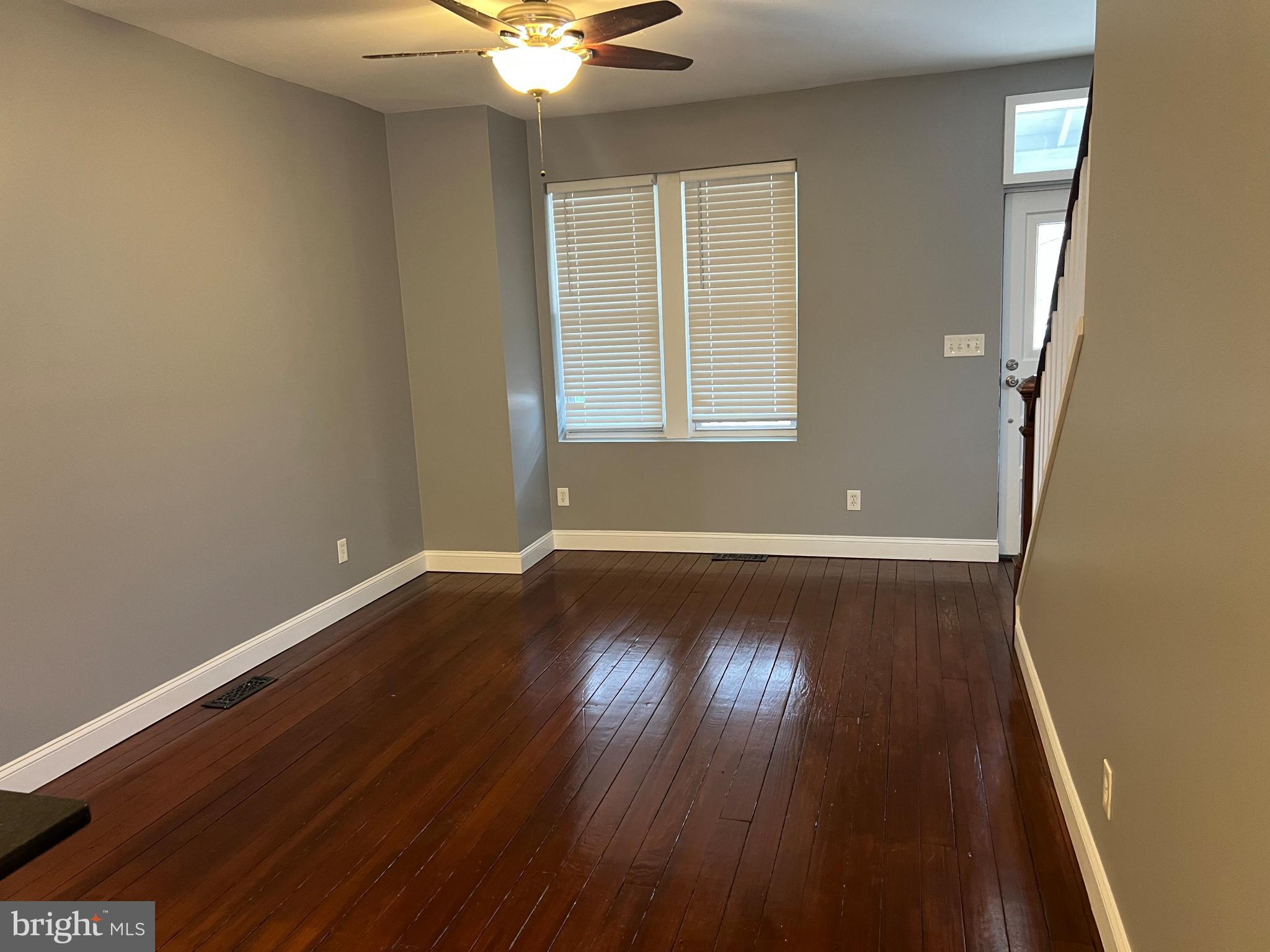 102 3rd Avenue Roebling, NJ 08554 - Photo 7 of 8 an empty room with wooden floor and windows