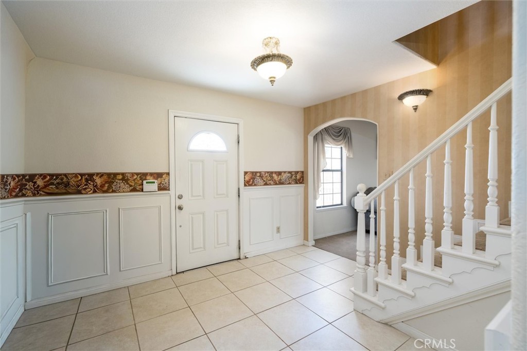 34150 Stowe Road Winchester, CA 92545 - Photo 19 of 80 a view of entryway and hall with a dining table