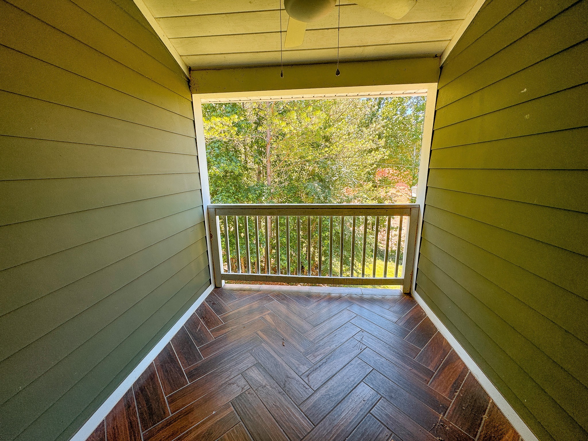 4042 Jones Hollow Road Lobelville, TN 37097 - Photo 14 of 30 a view of a room with wooden floor and a window