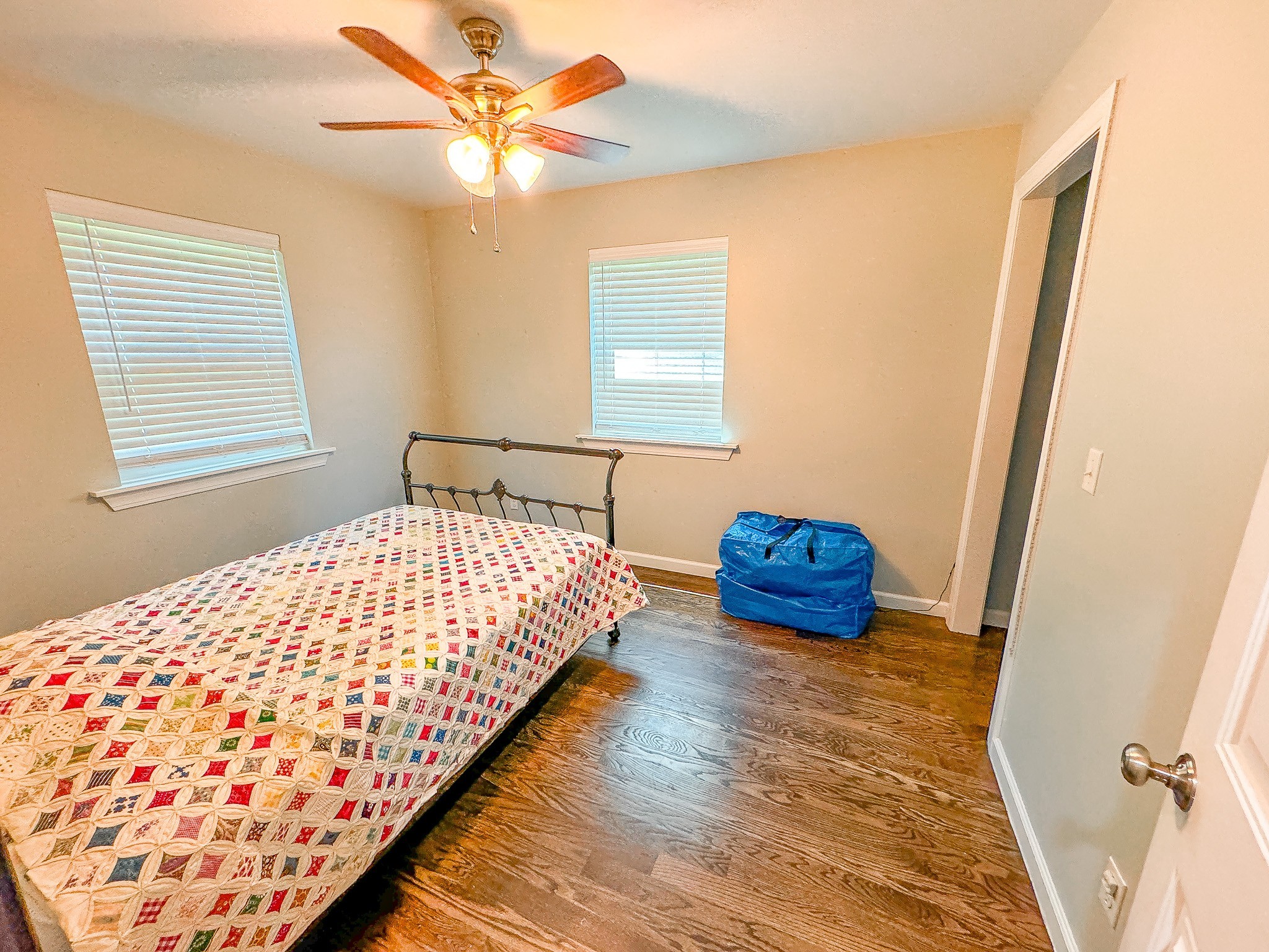 4042 Jones Hollow Road Lobelville, TN 37097 - Photo 17 of 30 a bedroom with bed and a window