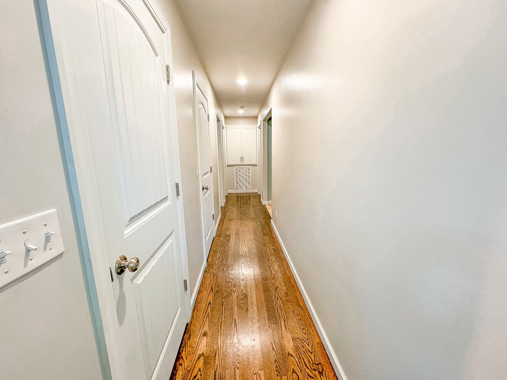 4042 Jones Hollow Road Lobelville, TN 37097 - Photo 22 of 30 a view of a hallway with wooden floor
