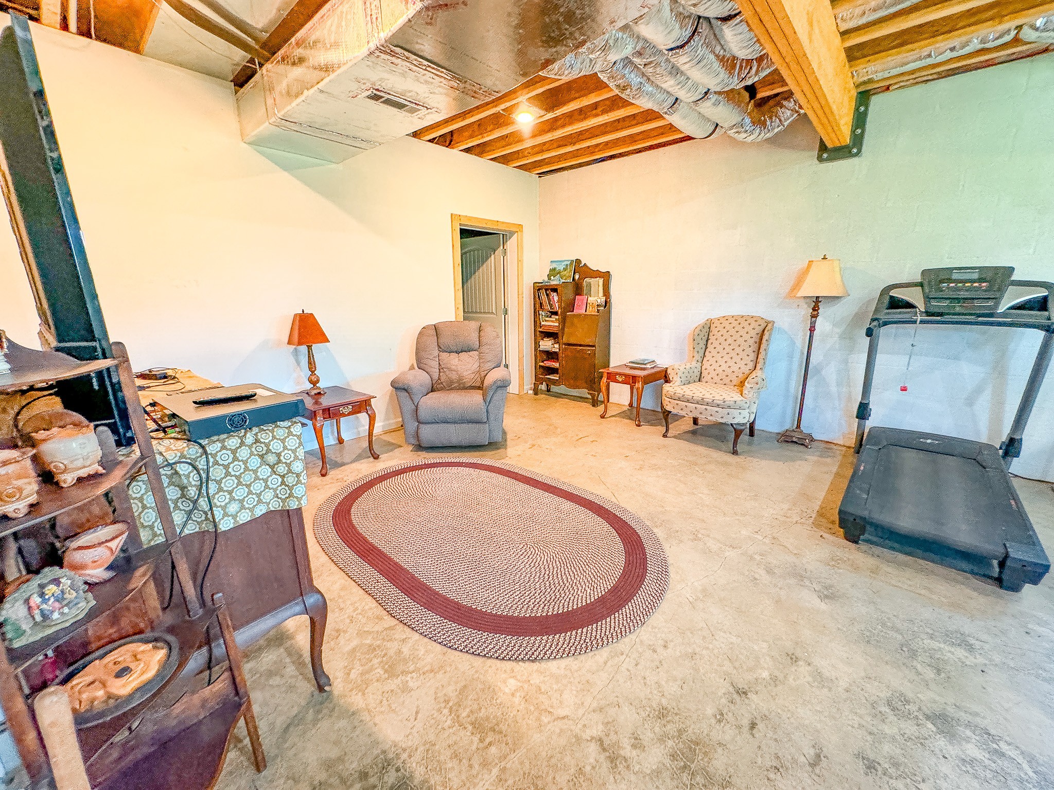 4042 Jones Hollow Road Lobelville, TN 37097 - Photo 24 of 30 a view of a swimming pool with a chairs and table in a patio