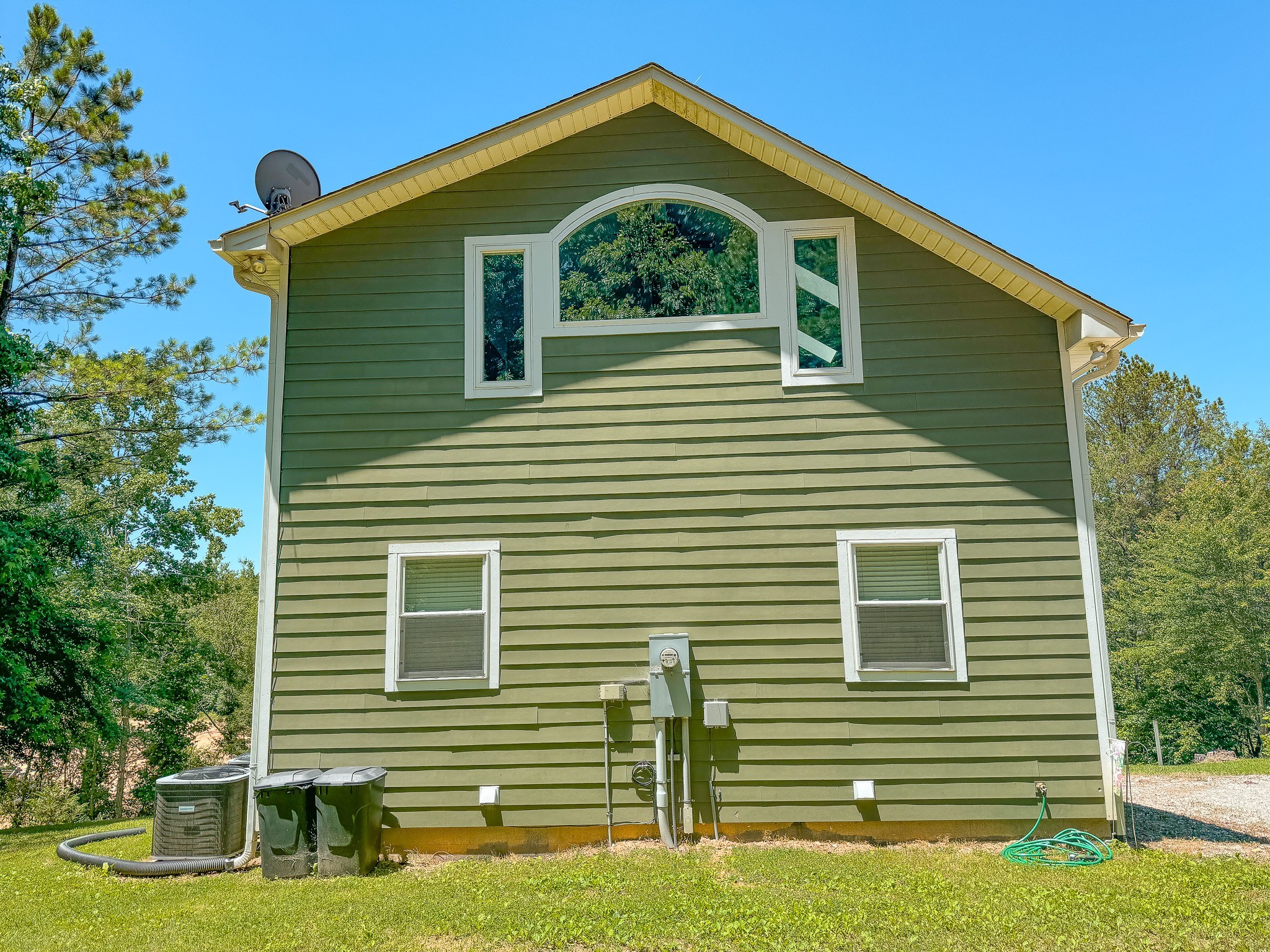 4042 Jones Hollow Road Lobelville, TN 37097 - Photo 27 of 30 a front view of a house with a yard