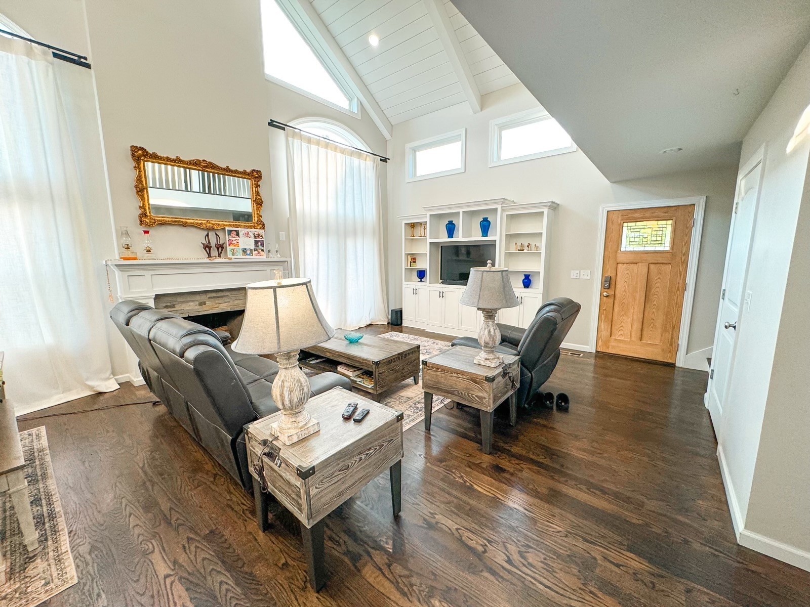 4042 Jones Hollow Road Lobelville, TN 37097 - Photo 5 of 30 a living room with furniture and a fireplace