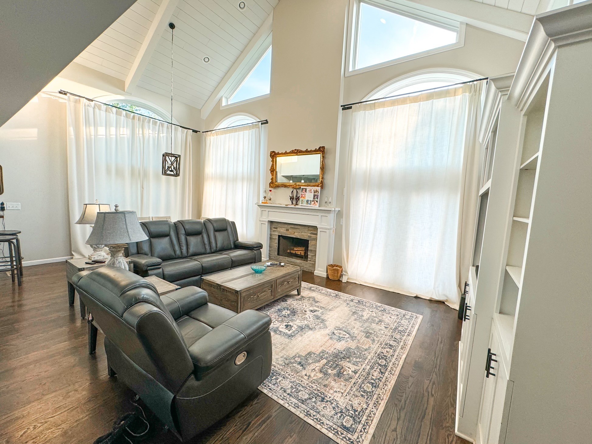 4042 Jones Hollow Road Lobelville, TN 37097 - Photo 6 of 30 a living room with furniture and a fireplace