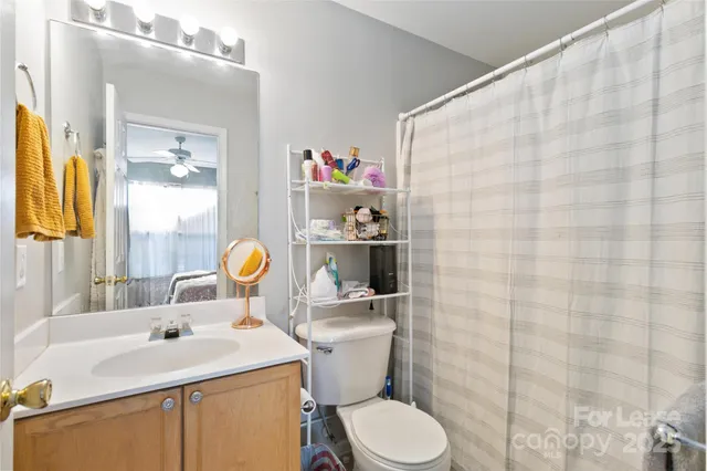 a living room with furniture and a gate