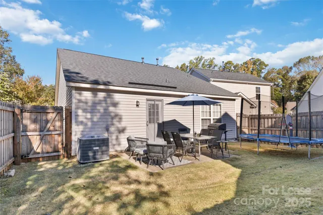 a view of a house with backyard porch and patio