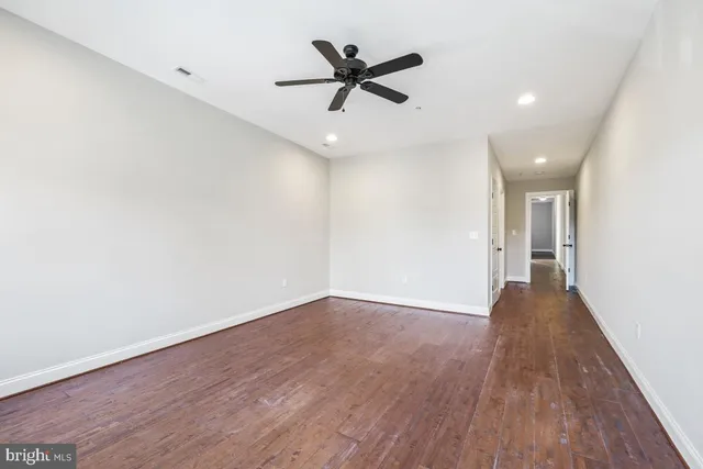 a view of a chairs on the roof deck