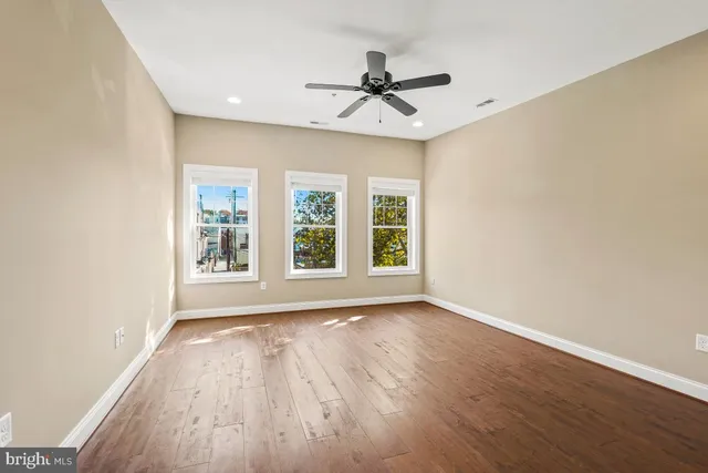 a view of a chairs on the roof deck