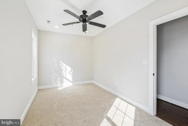 a street view of a house with swimming pool