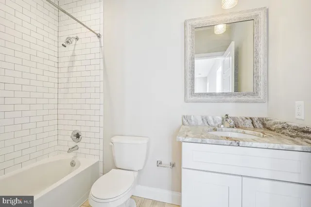 a view of a house with a yard and plants