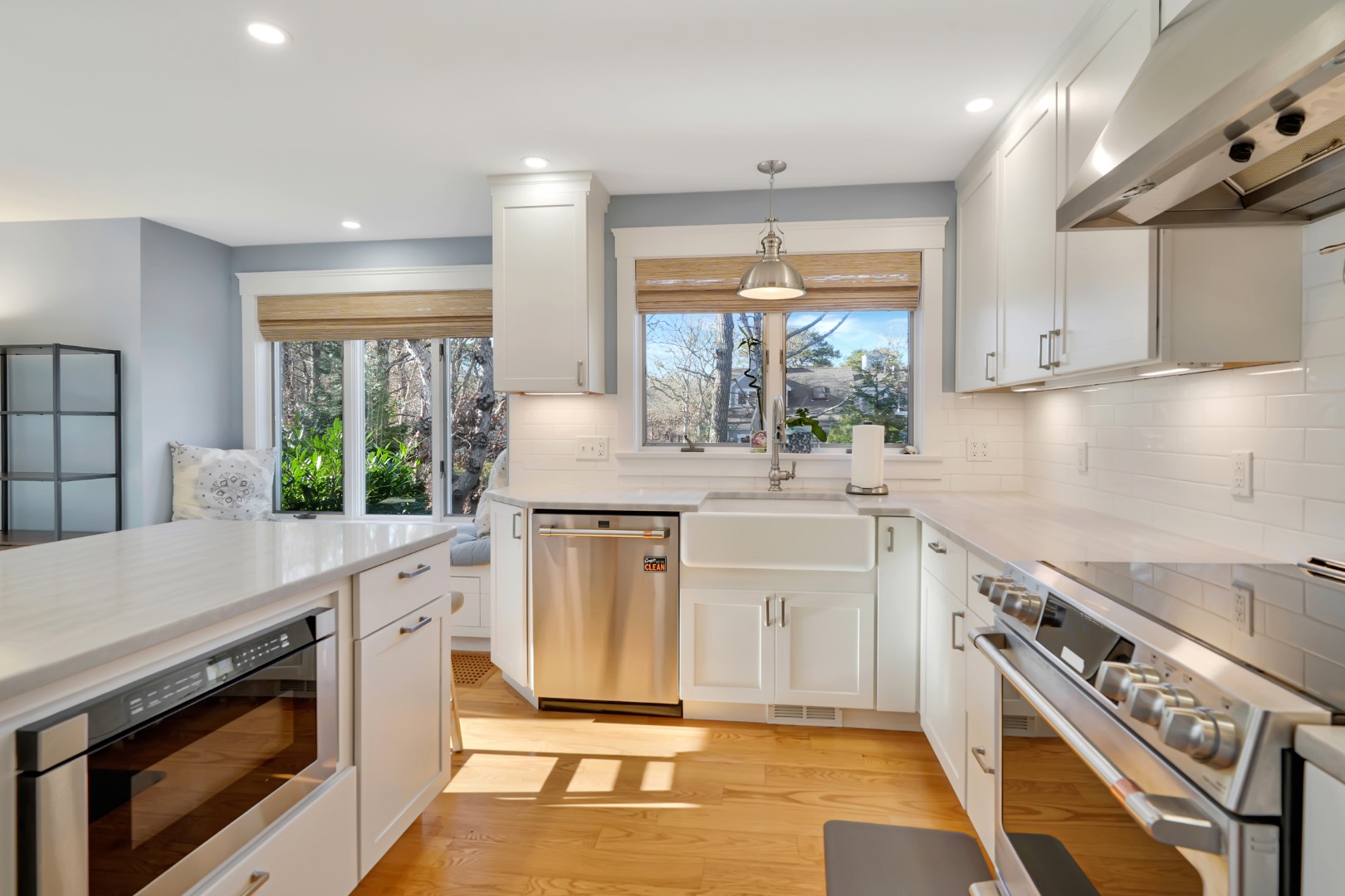 7 Meetinghouse Village Way Edgartown, MA 02539 - Photo 11 of 27 a kitchen with white cabinets appliances and a sink