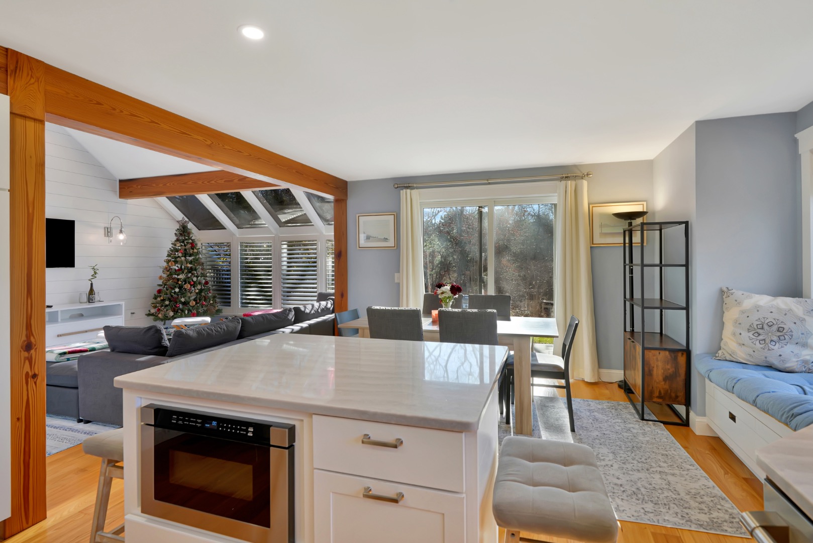 7 Meetinghouse Village Way Edgartown, MA 02539 - Photo 12 of 27 a living room with furniture and a fireplace