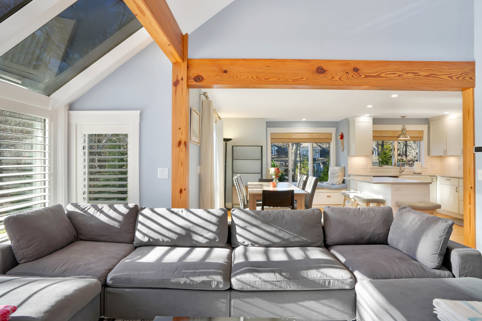 7 Meetinghouse Village Way Edgartown, MA 02539 - Photo 7 of 27 a living room with furniture and a large window