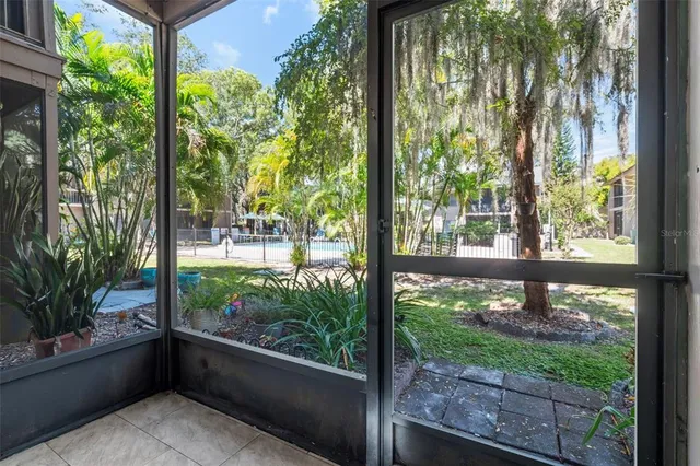 a view of a porch with a yard