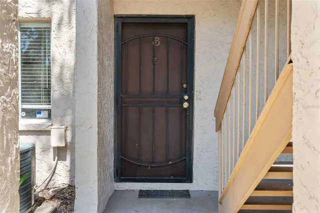 a view of entryway with a front door