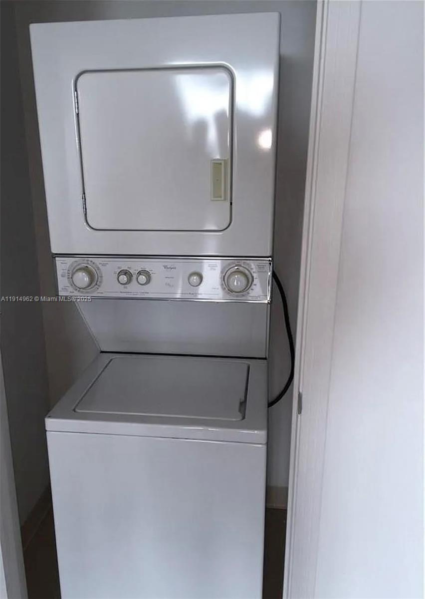 9066 Southwest 73rd Court, Unit 2101 Miami, FL 33156 - Photo 8 of 10 a close view of washer and dryer
