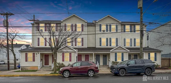 a car parked in front of a house