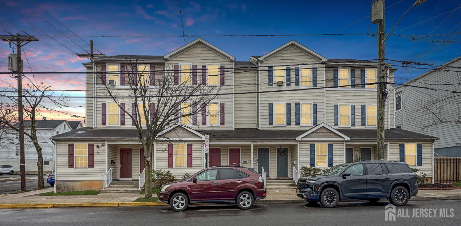 a car parked in front of a house