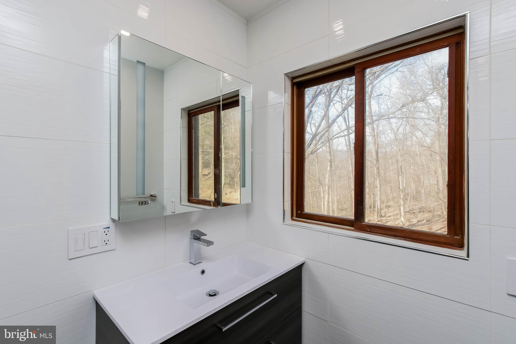 2943 Ward Kline Road Myersville, MD 21773 - Photo 29 of 69 Floating vanity with defogging mirror cabinet