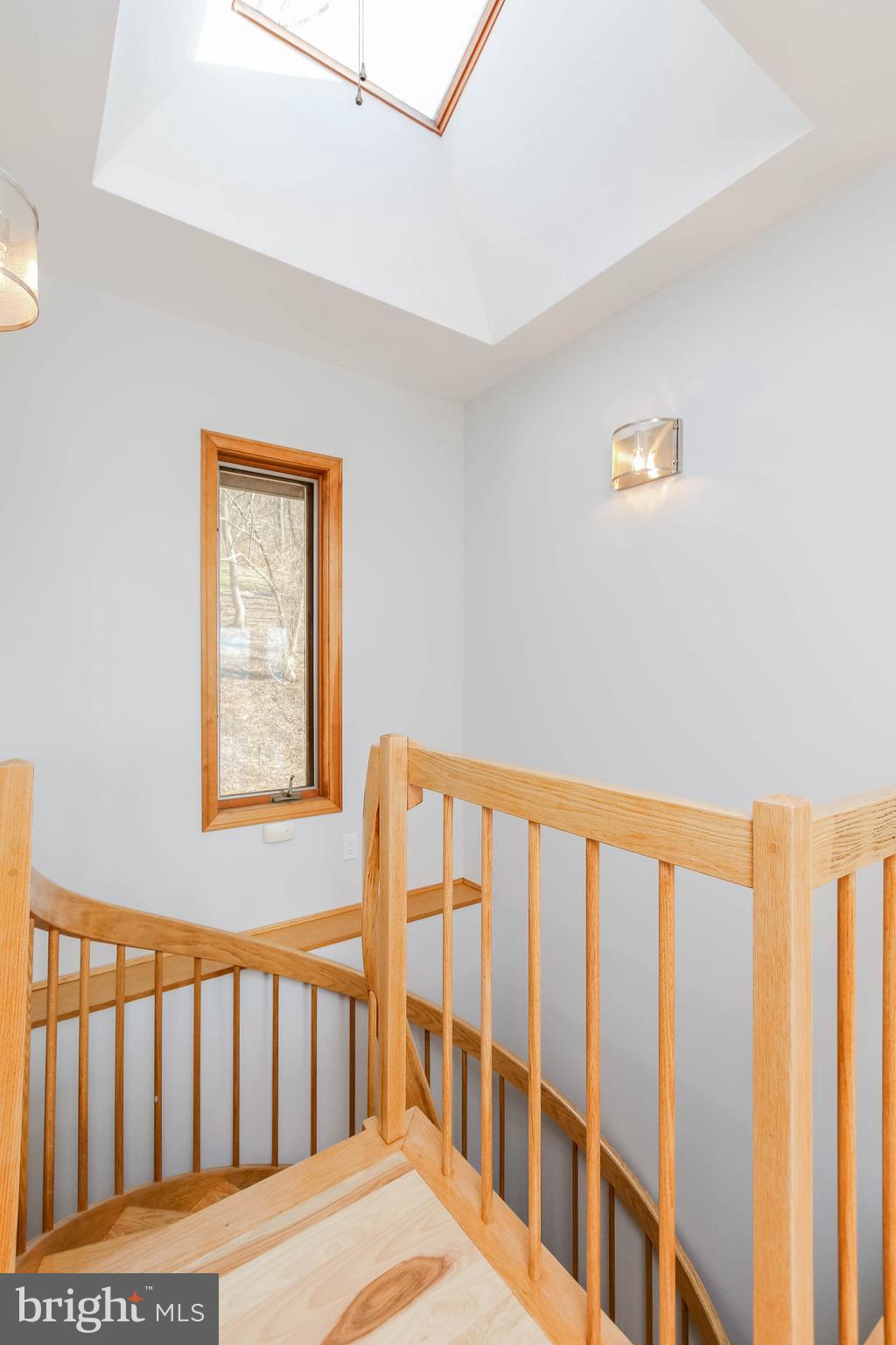 2943 Ward Kline Road Myersville, MD 21773 - Photo 33 of 69 Custom wood spiral staircase with skylight above