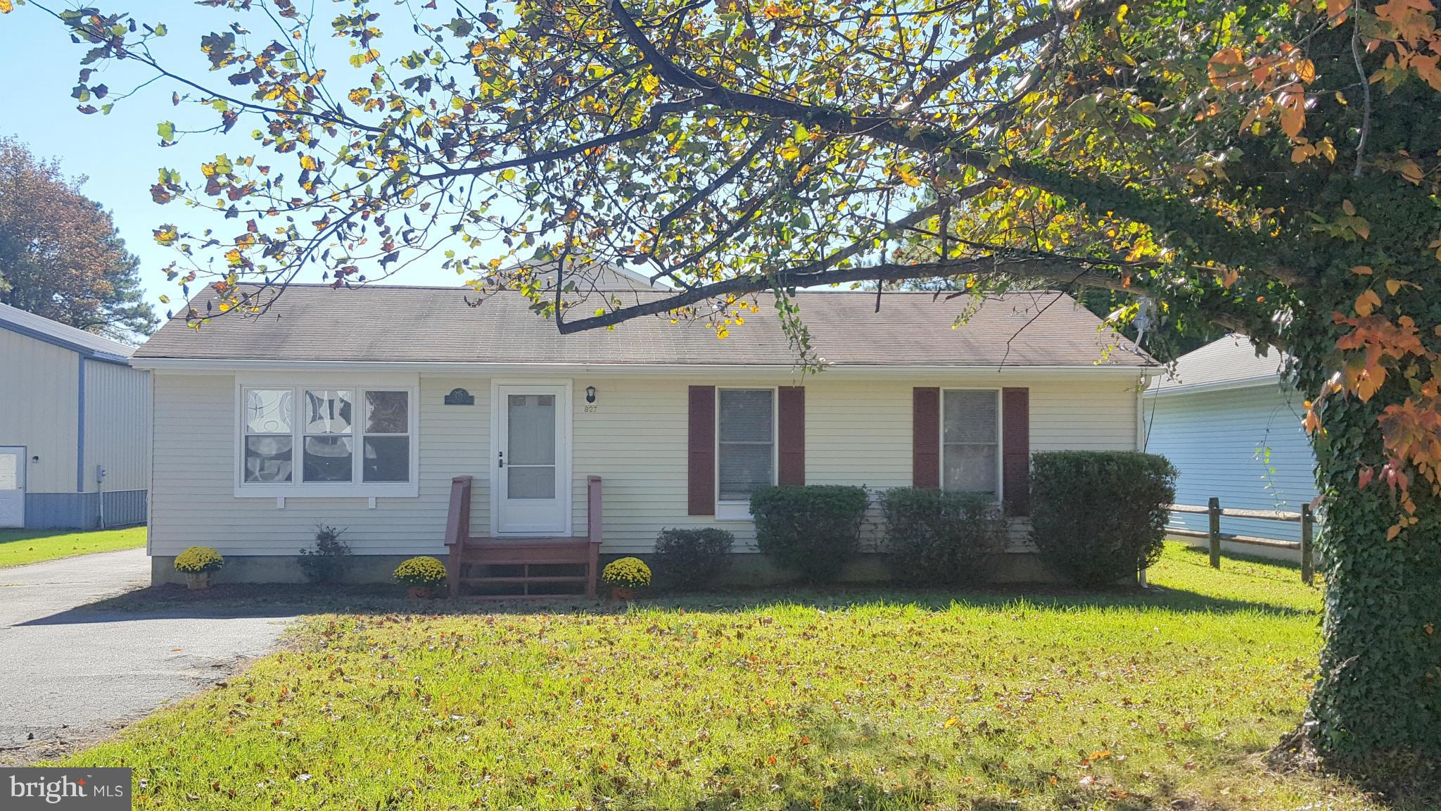 927 Crystal Rock Road Lusby, MD 20657 - Photo 2 of 30 a front view of a house with a yard
