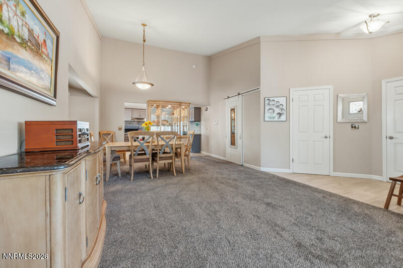 675 College Drive Reno, NV 89503 - Photo 7 of 30 a view of a kitchen with furniture and a refrigerator