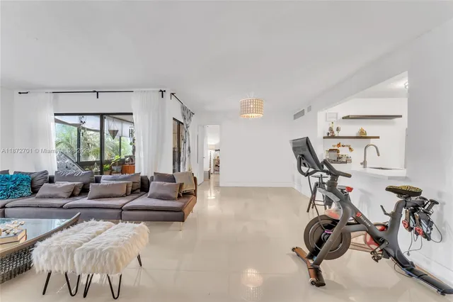 a kitchen with a sink stove and refrigerator