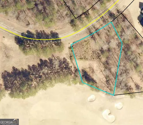 a view of a wooden wall with a lake view