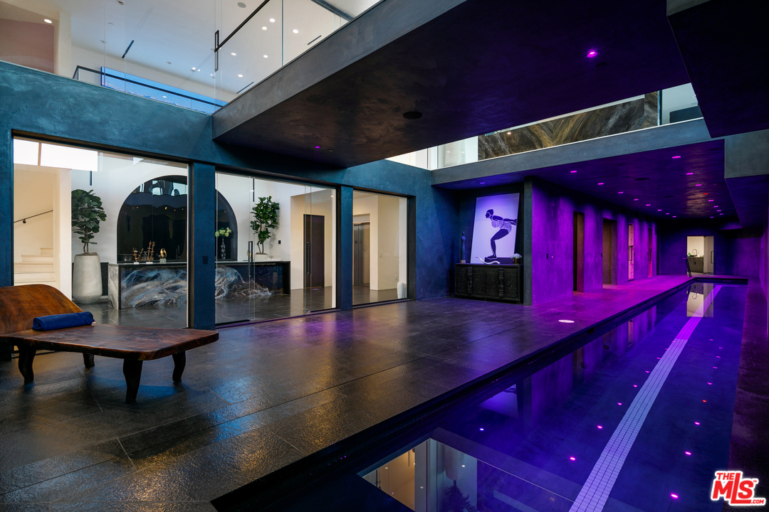 10697 Somma Way Los Angeles, CA 90077 - Photo 21 of 25 a view of swimming pool with a chair