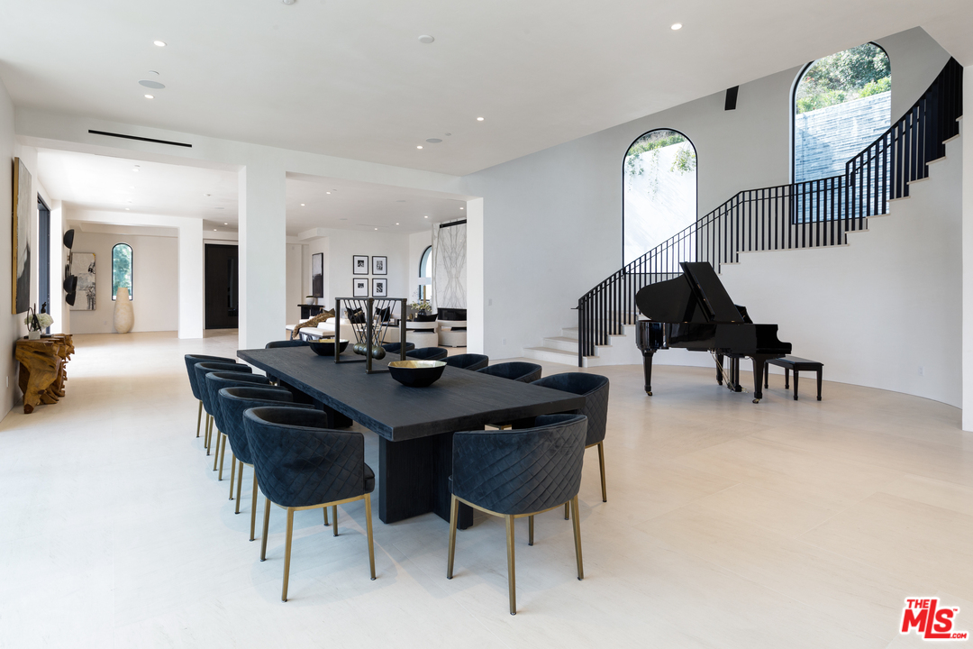 10697 Somma Way Los Angeles, CA 90077 - Photo 8 of 25 a view of a dining room with furniture
