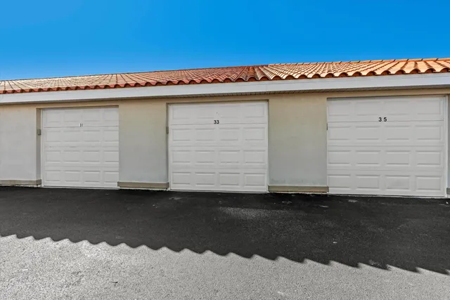 a view of a utility room with wooden floor