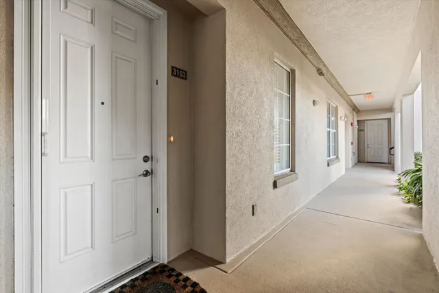 a sign on the side of a tree