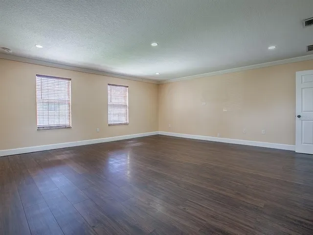 a view of a livingroom with a hardwood floor