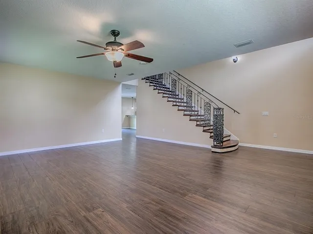 a view of entryway with wooden floor