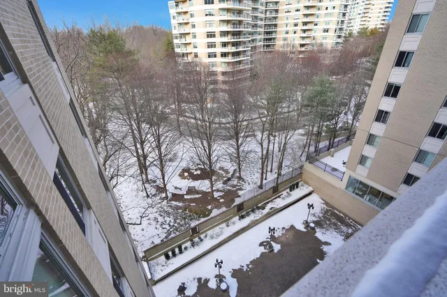 a view of balcony with wooden floor