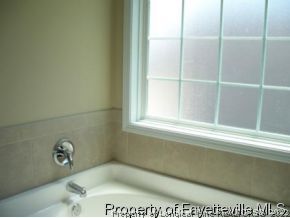 344 Cape Fear Road Raeford, NC 28376 - Photo 8 of 12 a bathroom with a bathtub