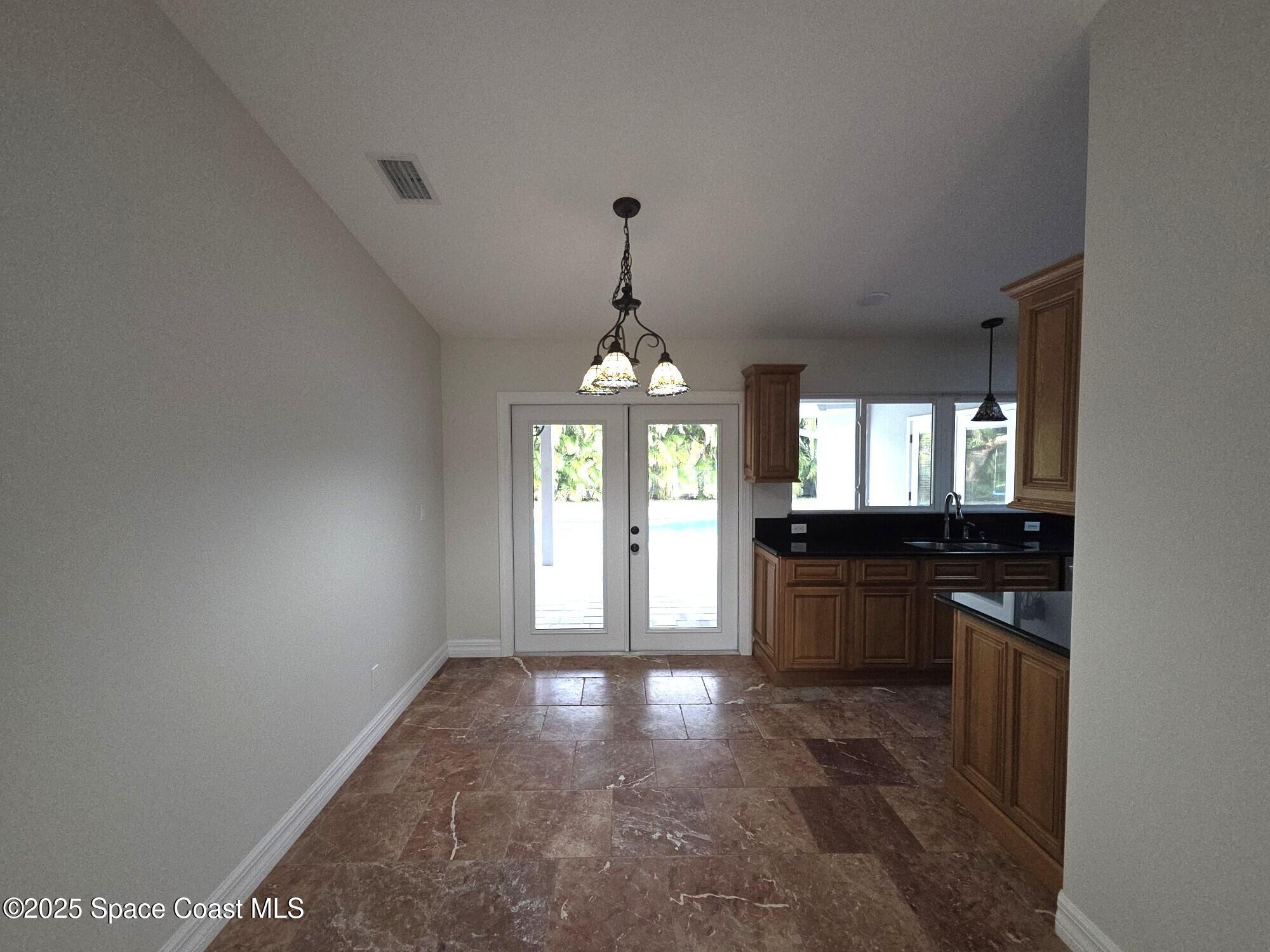 190 Sea Crest Drive Melbourne Beach, FL 32951 - Photo 3 of 16 Dining w/Pool View