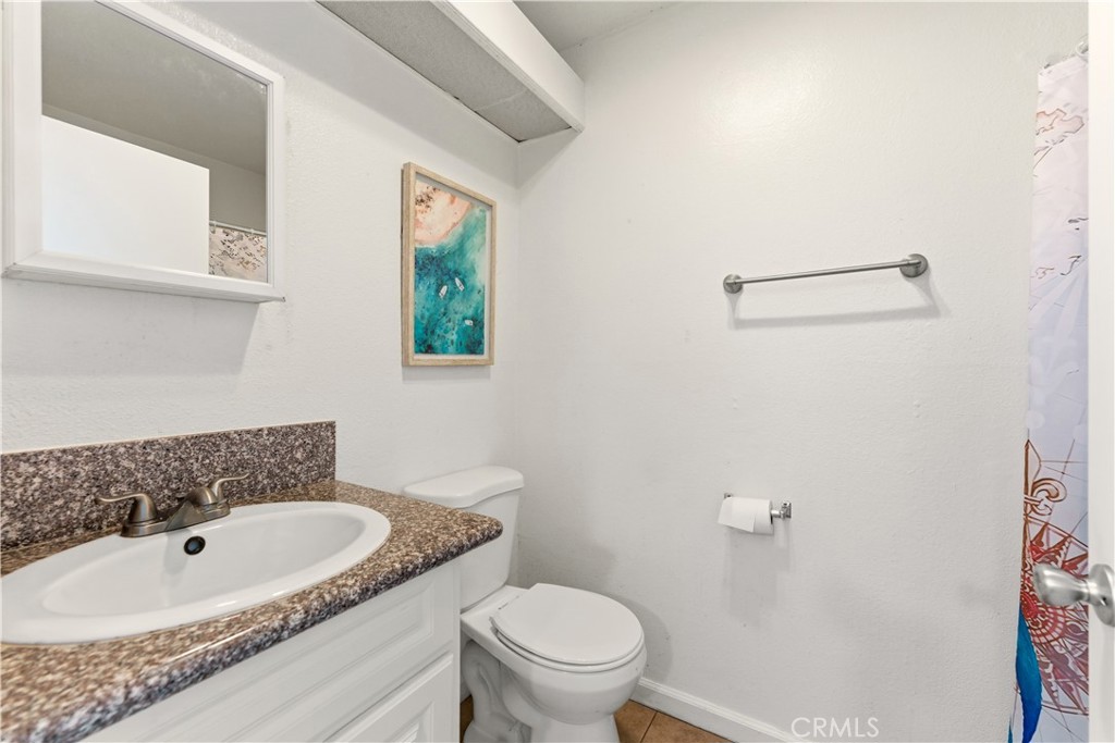 600 West 3rd Street, Unit B116 Santa Ana, CA 92701 - Photo 6 of 9 a bathroom with a sink and a toilet